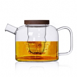 Glass tea pot with wooden lid